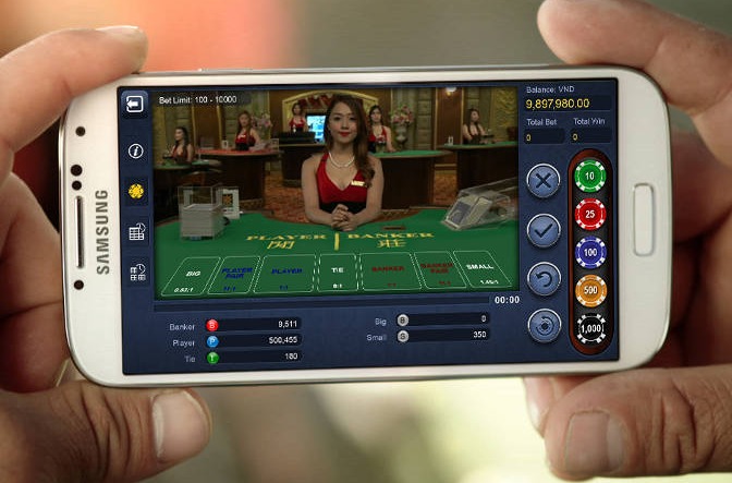 Baccarat game lobby on a mobile phone showing live and RNG tables
