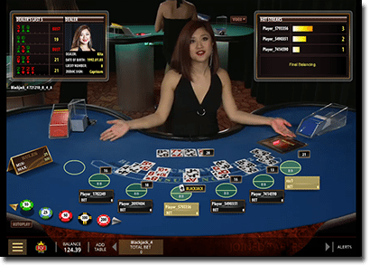 Live blackjack table interface close-up with dealer and dealt cards