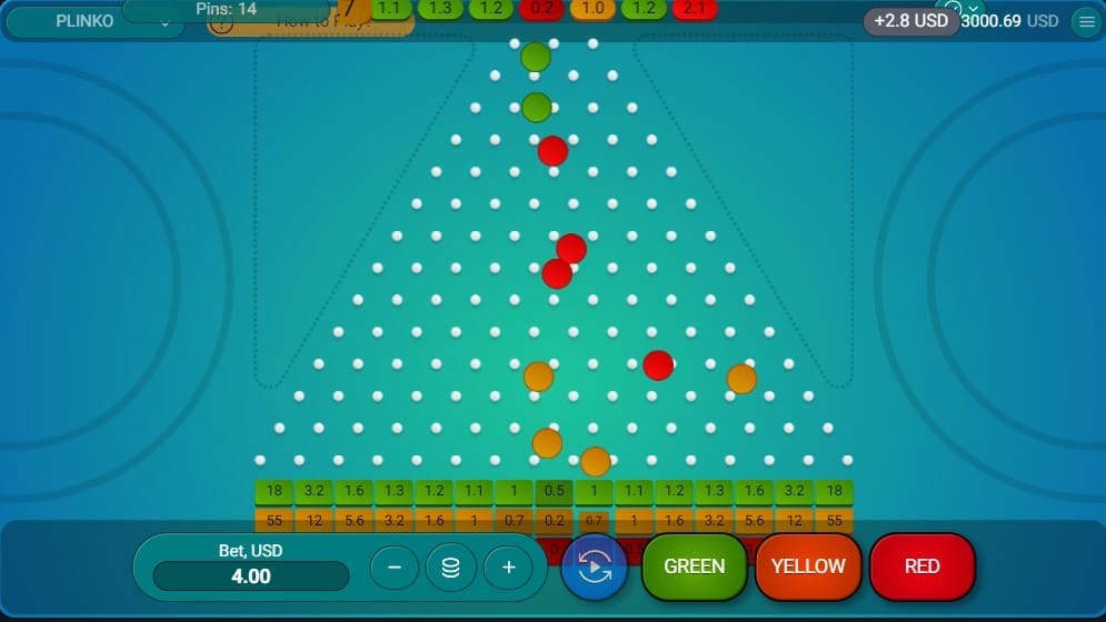 Plinko casino game — drop green yellow or red risk balls on the pegboard